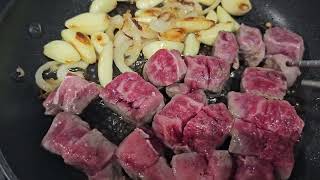 Let's have lunch! 10oz Grassfed Ribeye Steak with Garlic, Onions & butter, home made meal, protein How Much Protein In A 10 Oz Steak