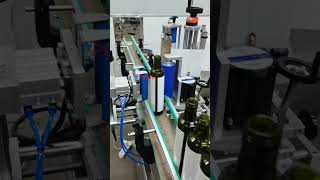 Sticker labeling machine positioning label applicator #machine #cleanerfillingmachine #soda #factory