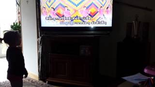 Little Girl Dancing To Isan Thai Music