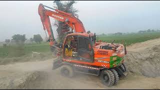 Excavator stuck in canal | Excavato...
