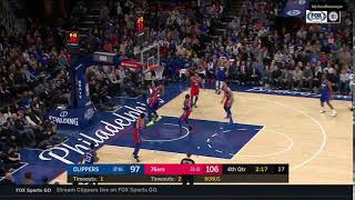 Joel Embiid swats away Marcus Morris' layup