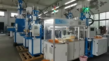 Dental floss vertical injection molding machine with automated device production testing