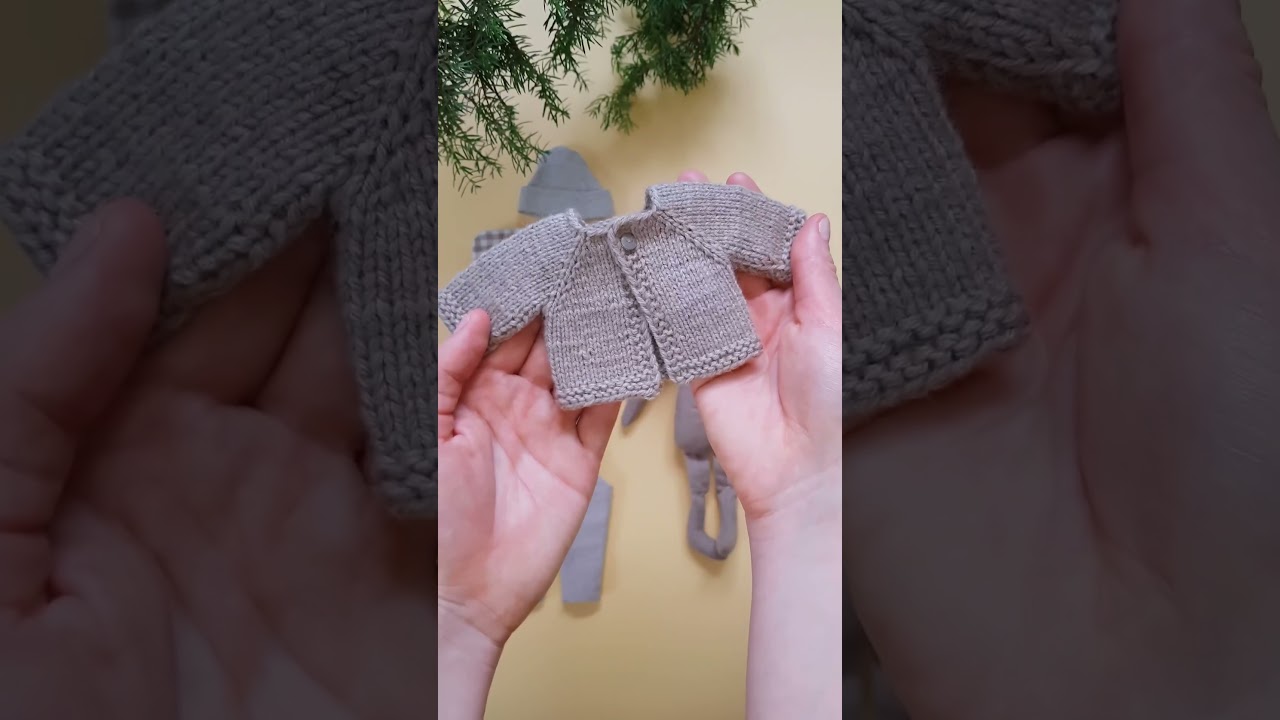 Knit a cosy cardigan for your doll - easy pattern available! 