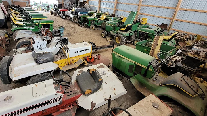 my entire collection of 43 garden tractors + attachments. 40 John deeres and 3 gravelys