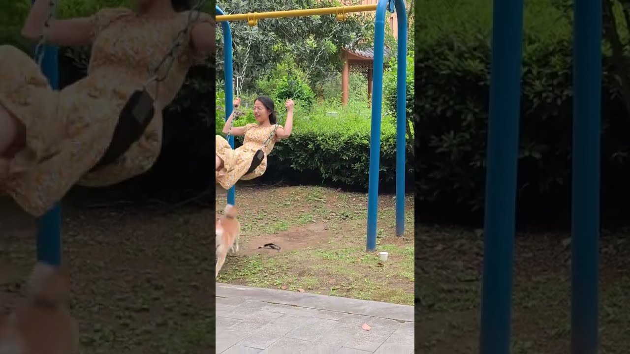Woman Accidentally Kicks Excited Dog While Swinging In Hunan China