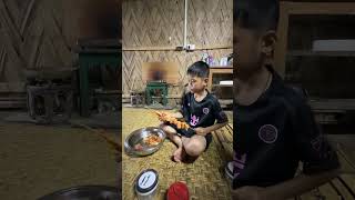 My  2nd no  son Iran Maling Cherom  is preparing for Chicken Roasting 