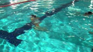 Diving to pick up things at the bottom of the pool I