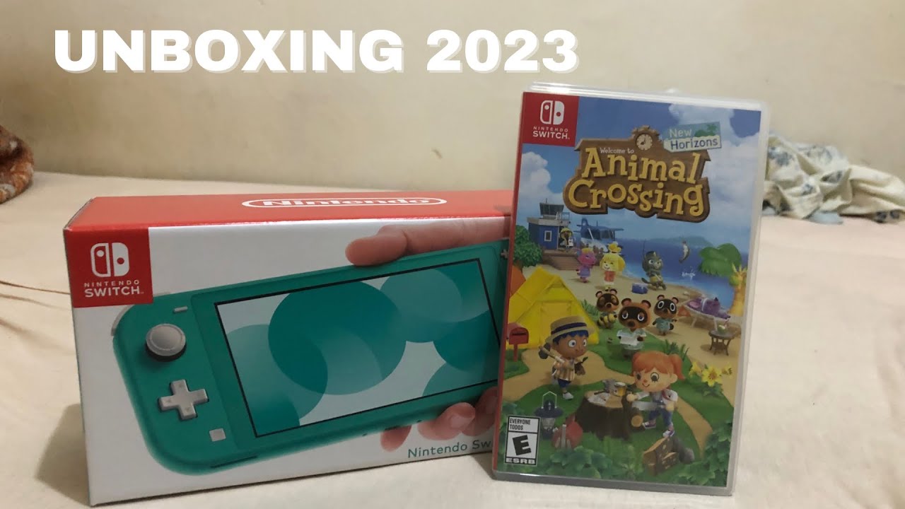 Consola Nintendo Switch Lite Turquesa + Jogo Animal Crossing: New Horizons  (Pré-instalado)