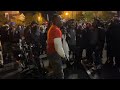 Trump Supporter Taunts Protester Before Being Escorted Away by Police