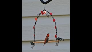 How to Make an Adorable Hummingbird Swing using Red Buttons, a dowel, and wire.