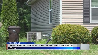 Two charged in Peoria homicide after body found in freezer