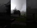 Icy calm of the cameraman  terrifying tornado destroys walls and breaks trees in central europe