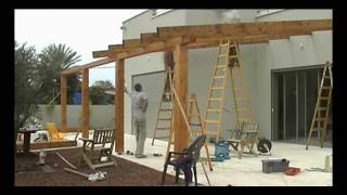 Pergola A Pergola is a wooden freestanding or off the house structure built as an outdoor sitting area with lattice or open slat roof for 