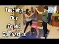 Teaching our friend gymnastics