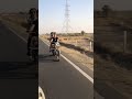 TikTok women riding bullet with kid in shorts