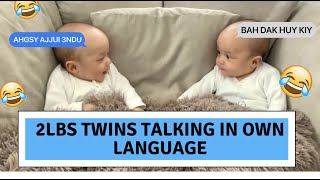 The 2lb twins speaking to each other in own language