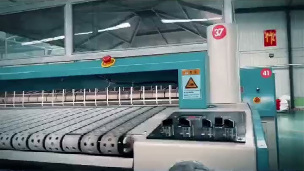 Efficient Flatwork Laundry Solutions: Feeding, Ironing & Folding Systems by HOZO