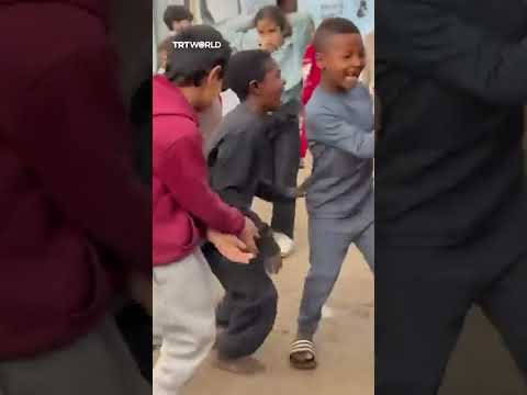 Palestinian child feeds her baby sister #trending #explore #shorts