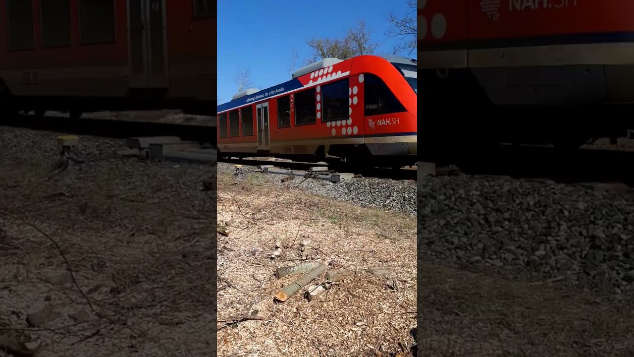 🚆 Triebwagen Lint DB 648 464-5 fährt am Bü Saarbrückenstraße als RE 74 in Ri Kiel-Hbf