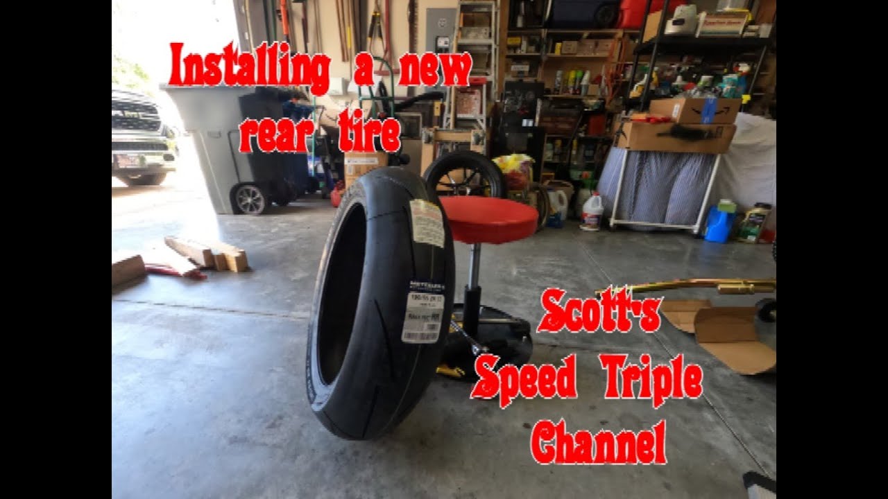 Installing a New Rear Tire on the Speed Triple 1200RS - YouTube