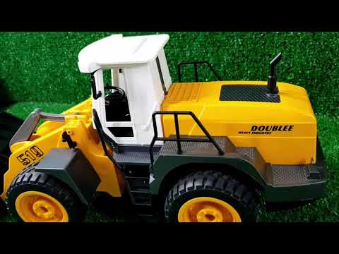 RC front loader, unboxing and challenge - პულტიანი ტრაქტორის გახსნა და გამოცდა.