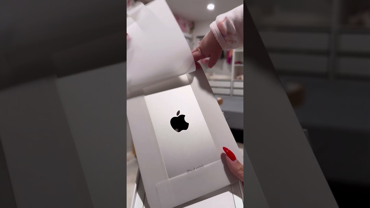 unbox my iPad mini with me and my baby , I engrave her name on it