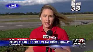 Crews clean up scrap metal from highway in Lawrence County