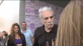 عمر الشريف يضرب وحدة في مهرجان الدوحه  Omar Sharif slaps woman