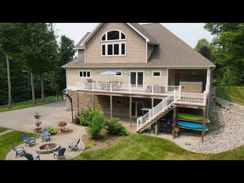 10041 Timber Valley Court, Rapid City, MI home video tour