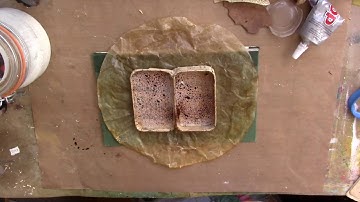 day #9  challenge  found object assemblage with rivets