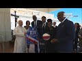 POPE LEO TRIES his hand at BASKETBALL with the HARLEM GLOBETROTTERS