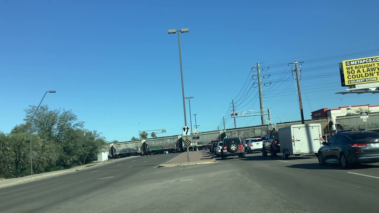 A UP westbound train passes Val Vista Dr heading to Phoenix AZ 12/7/25