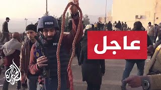 Thumbnail for مراسل الجزيرة: يبدو أن فرق الإنقاذ وصلت إلى بعض الزنازين السرية بسجن صيدنايا في ريف دمشق