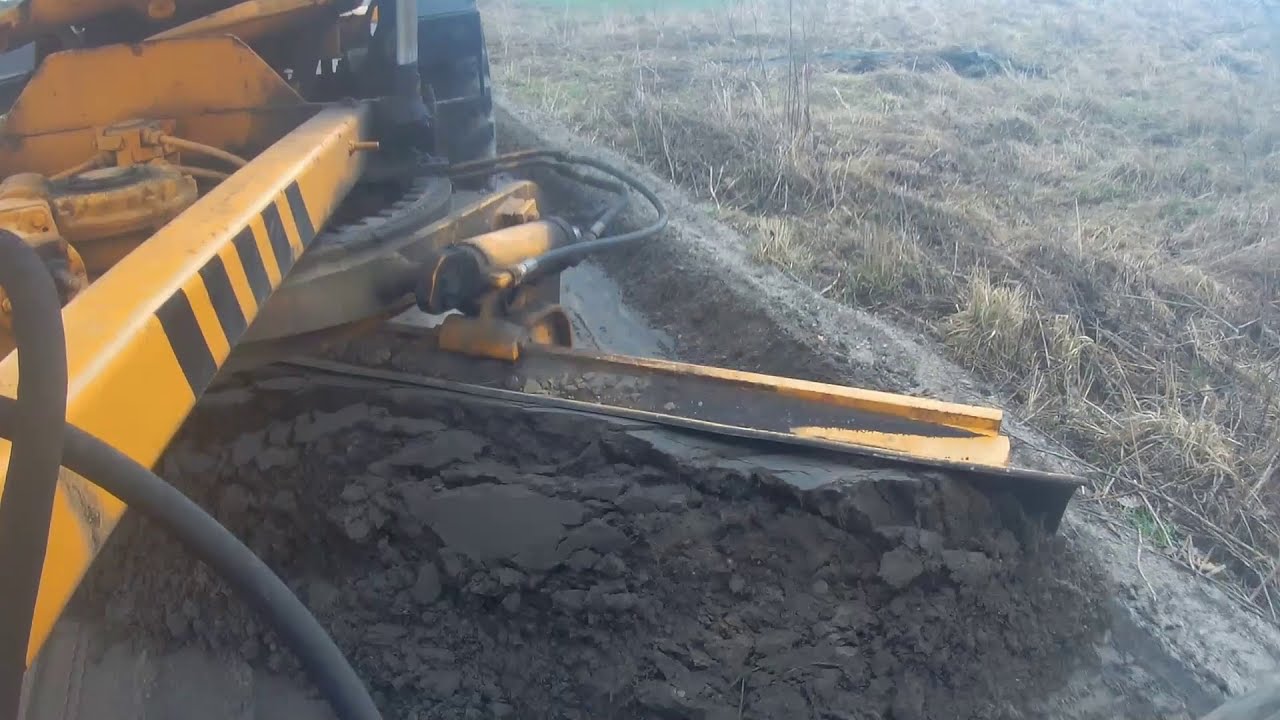 Równanie drogi równiarką, Moto grader DZ