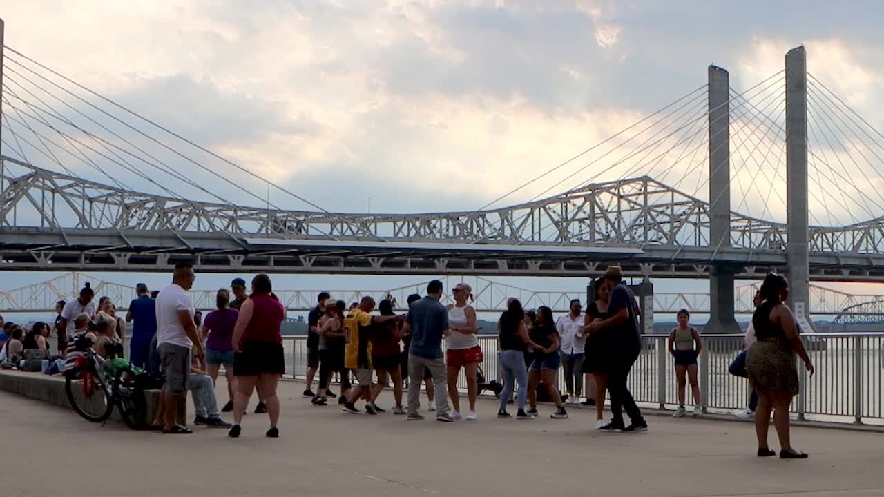 Community group sharing salsa dancing with parties, promotions in Louisville