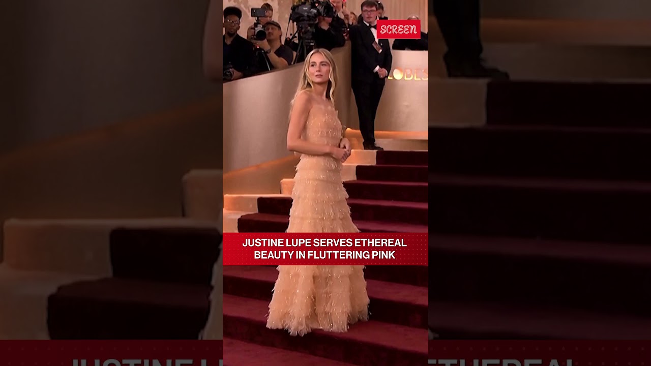 Golden Globes 2026: Justine Lupe Turns Heads In A Pink Layered Fabric Dress On The Red Carpet