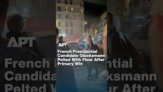 WATCH: French Presidential Candidate Glucksmann Pelted With Flour After Primary Win | APT