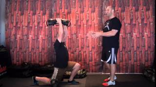 4 Kettlebell and Ultimate Sandbag Training Exercises to Improve Functional Fitness