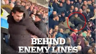Shocking moment Arsenal fan is thrown down the stairs