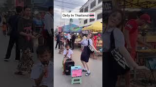 Thai Lady Is Dancing To The Sound Of Music In The Market