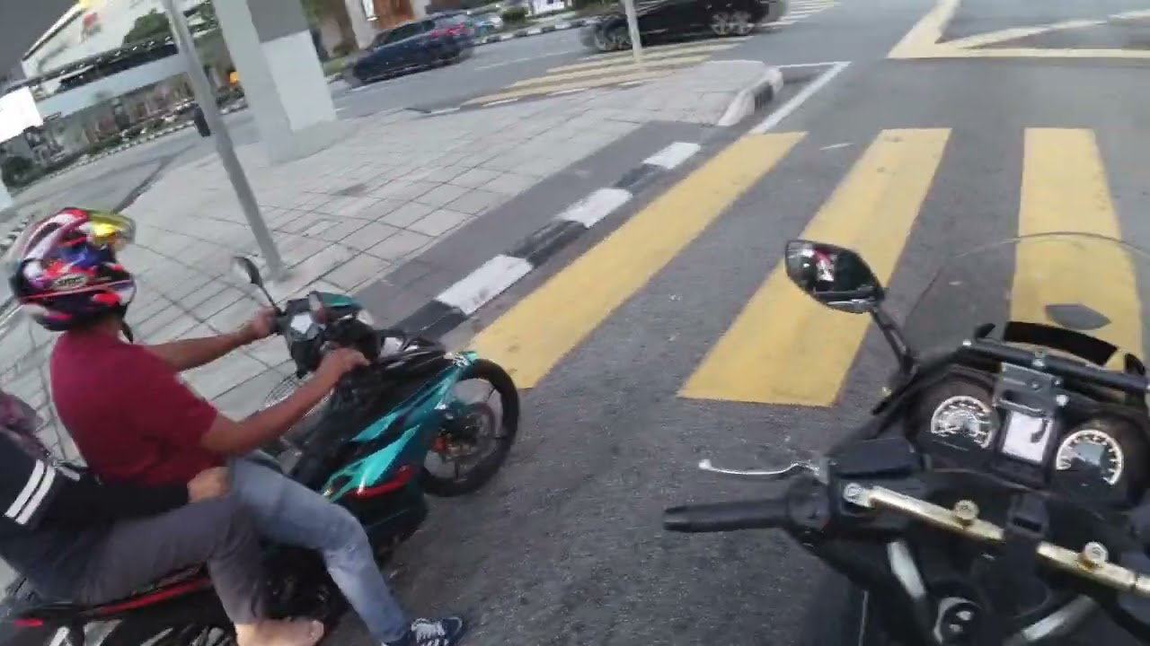 Mastering Kuala Lumpur Traffic: Navigating Motorcycle Handling Skills in the Heart of Malaysia.