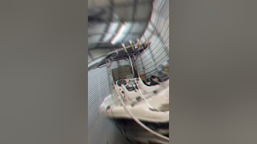 Shrink wrapping a Seahawk  center console.