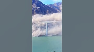 China’s Hongqi Bridge Partially Collapses After Massive Landslide | 10 News