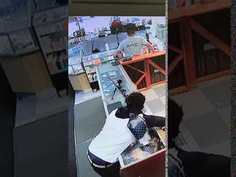 teen thug steals a gun from a pawn shop