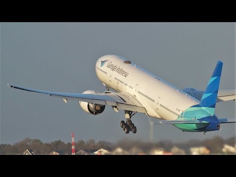 Garuda Indonesia B777 Departing in beautiful autumn lighting from Amsterdam Airport Schiphol