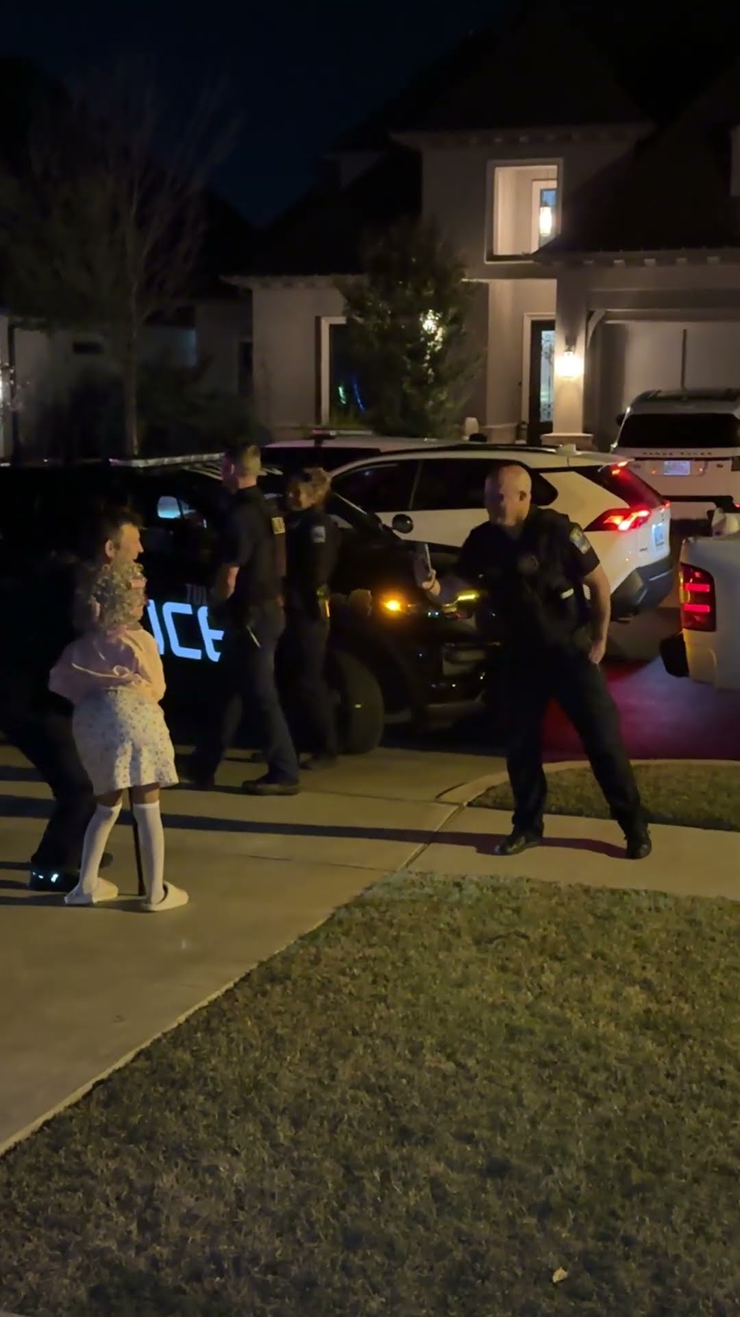 Young Grandma Poses With Police On Halloween || ViralHog