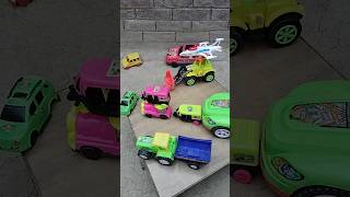 Big Green Car Pushing Autorickshaw Train Car In Table