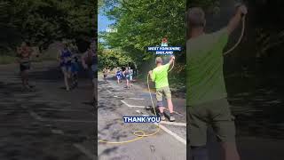 Kind resident sprays British marathon runners with garden hose to cool off