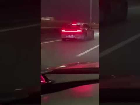 Xiaomi SU7 in heavy camo escaping paparazzi on highway in China