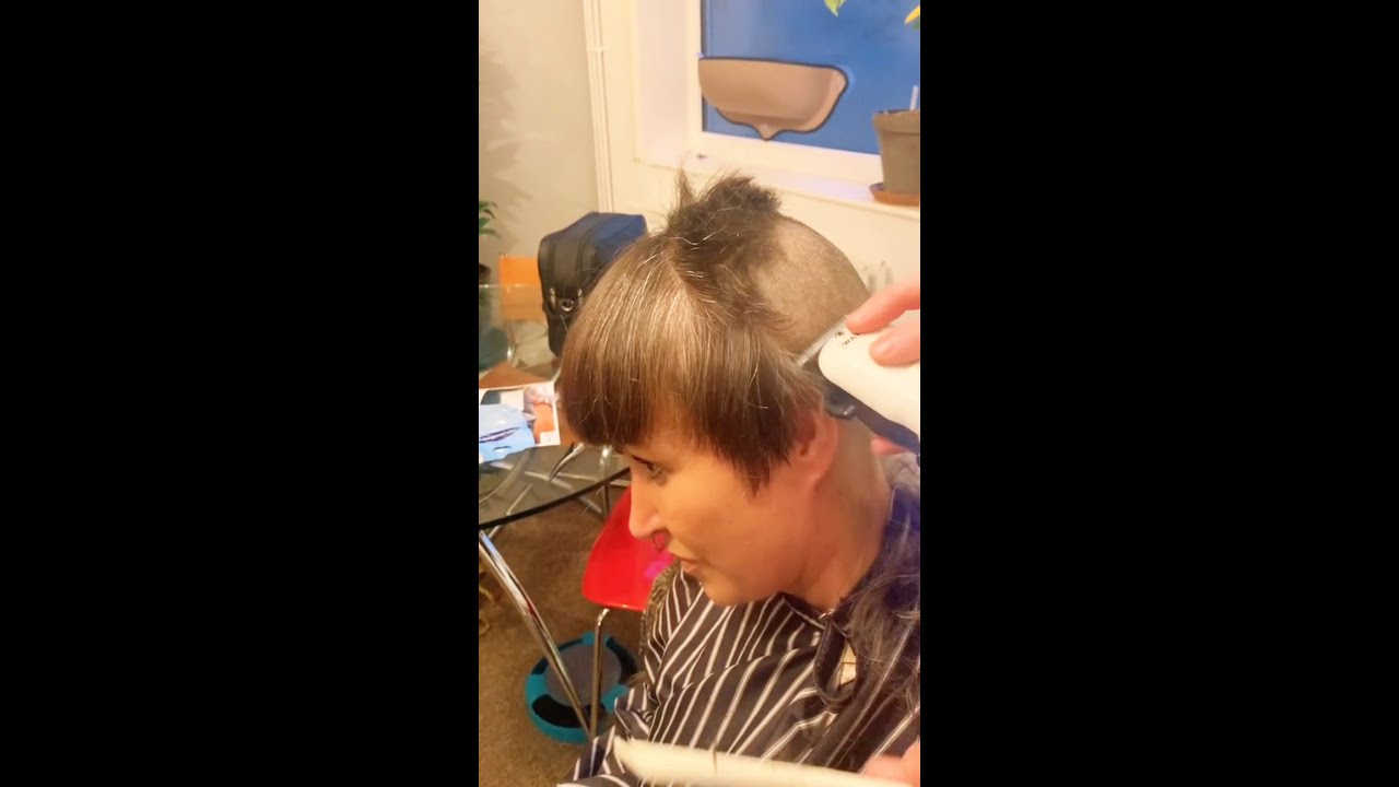 Beautiful lady headshave buzzcut..